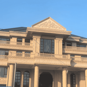 绍兴黄金麻别墅外墙干挂石材效果示例